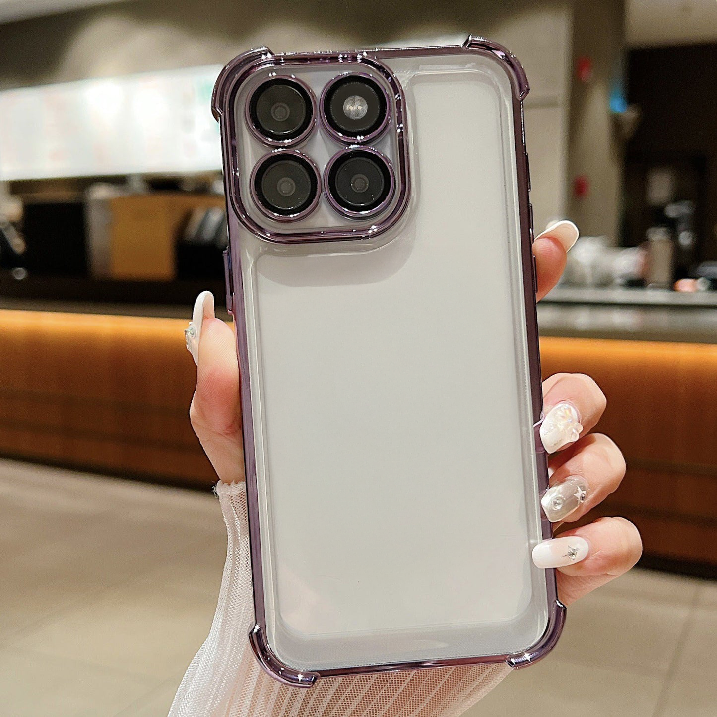 Motorola Edge 60 Pro 5G Phone case with camera lens protection held by a person in a kitchen setting